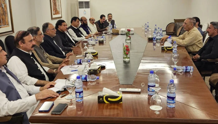 "Government ministers hold talks with Jammu Kashmir Awami Action Committee in Muzaffarabad after violent protests left nine dead and over 100 injured." Jammu Kashmir Awami Action Committee negotiations AJK protests Muzaffarabad latest news Reserved seats refugees Kashmir issue AJK internet restoration demand Government talks with JKAAC 2025 Azad Jammu Kashmir political crisis AJK constitutional amendment debate